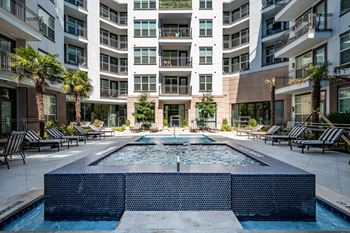 Refreshing swimming pool and jacuzzi with grilling station